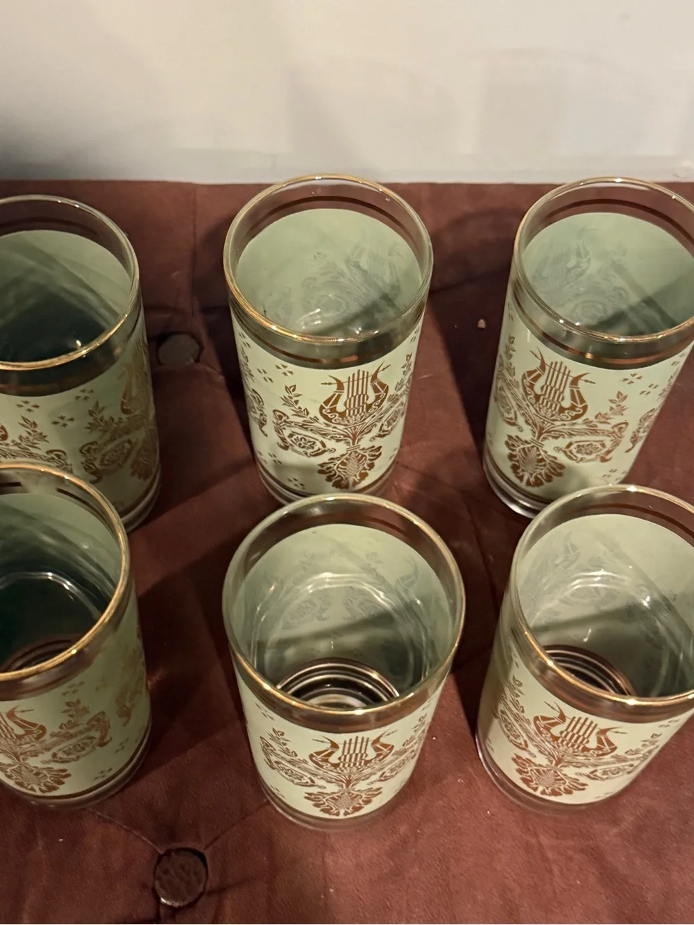 Set of 6 glasses vintage green and gold design. Holds 8 ounces